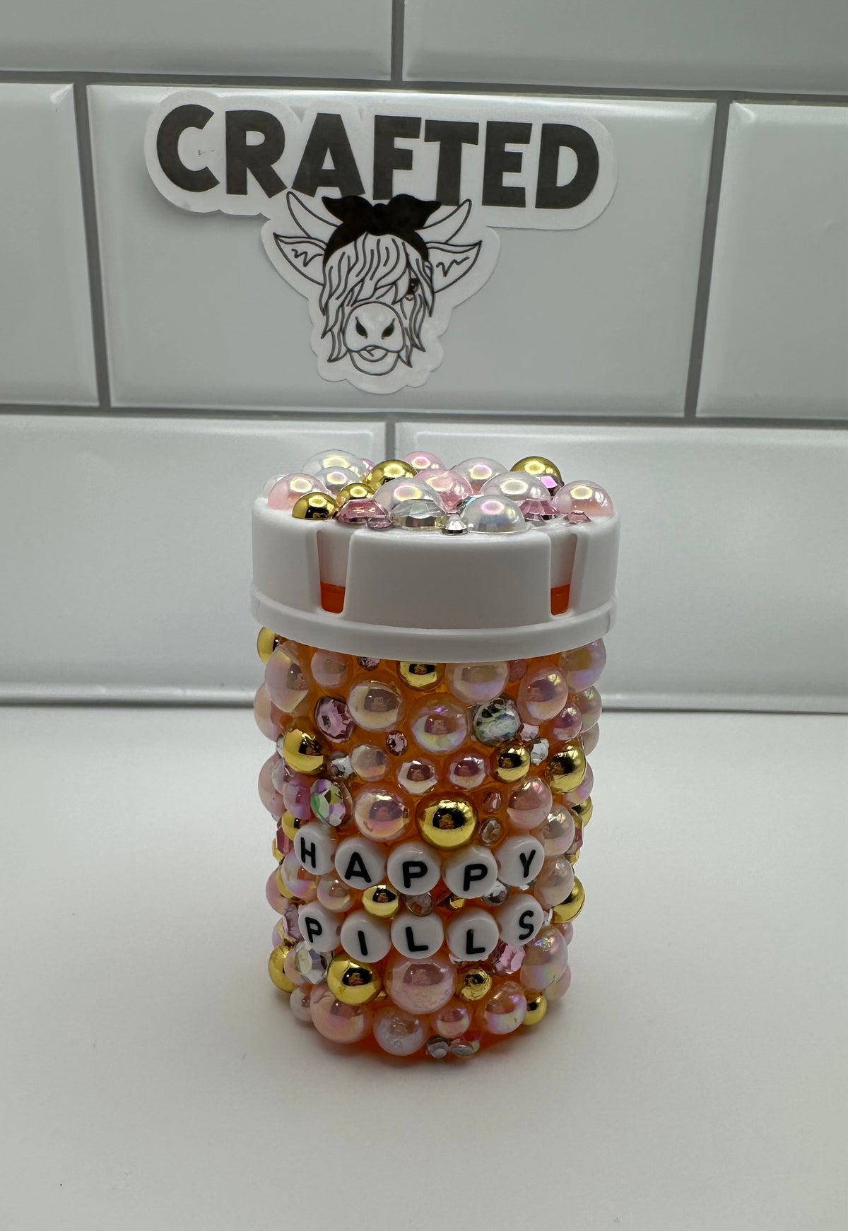 Embellished pill bottle “happy pills”