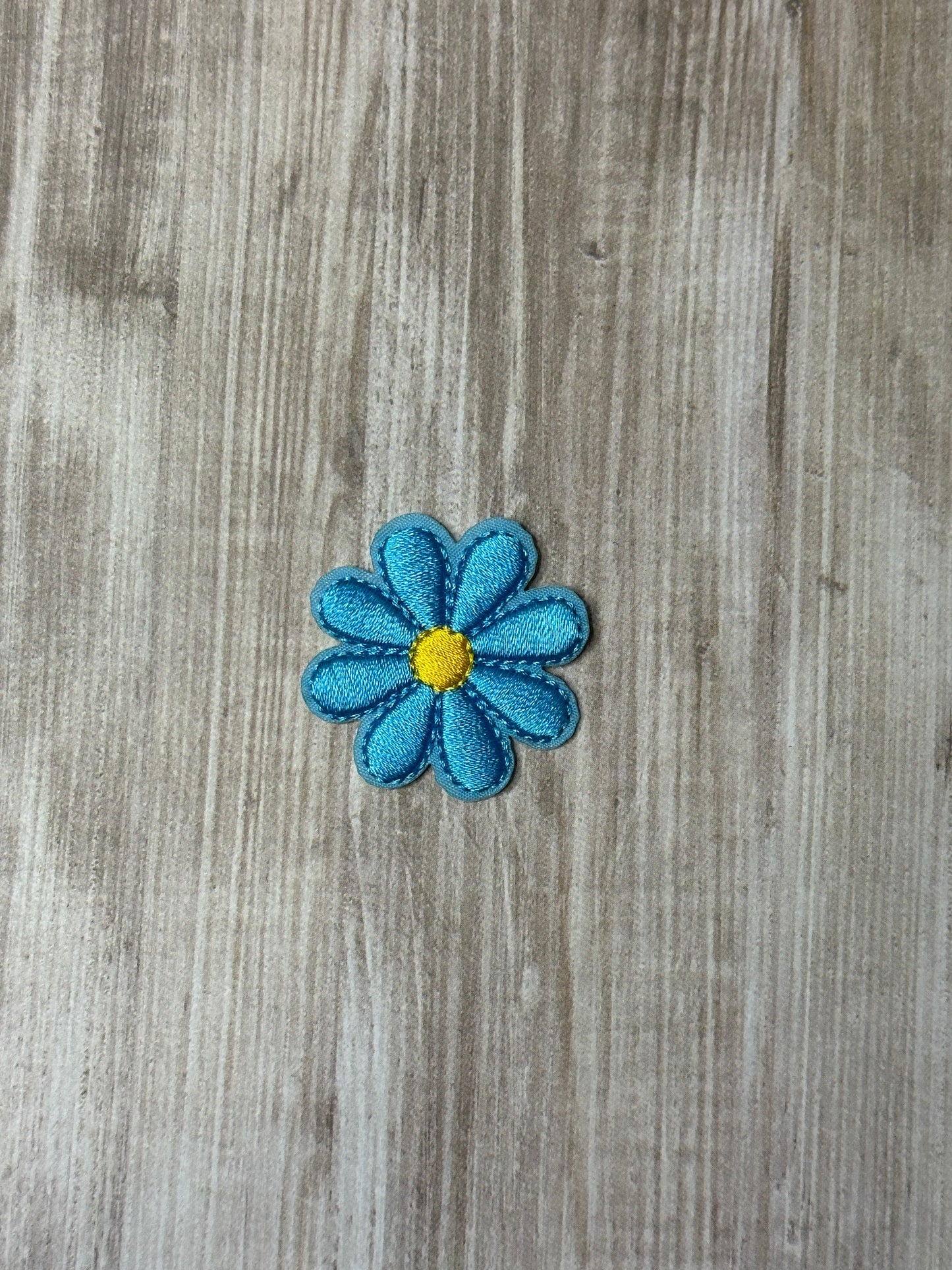 Small flower iron in trucker patch