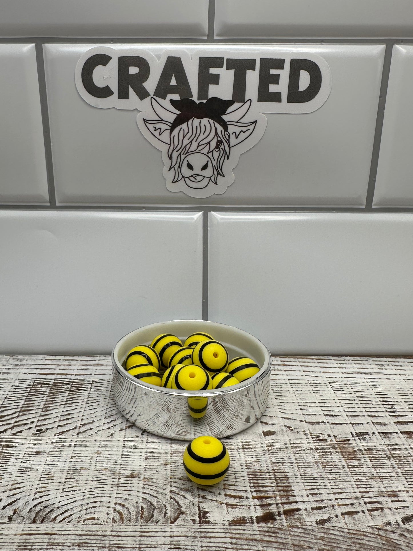 Yellow and black stripe 15 mm round print bead