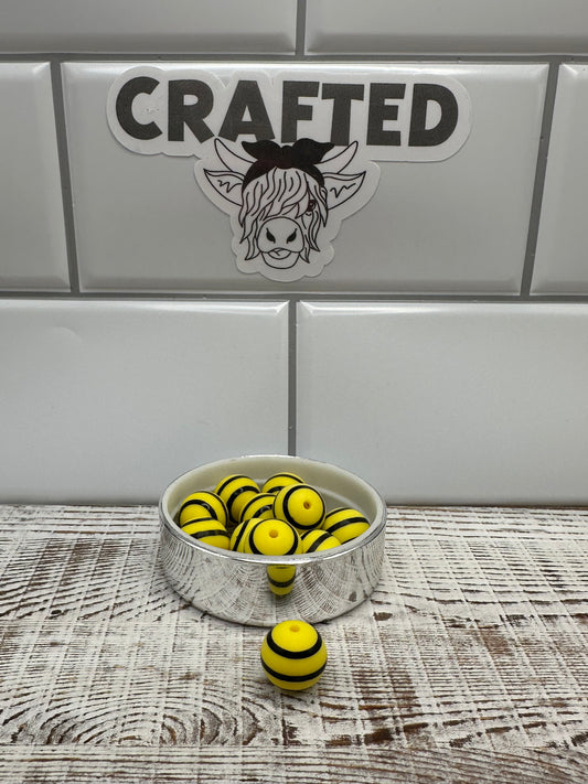 Yellow and black stripe 15 mm round print bead