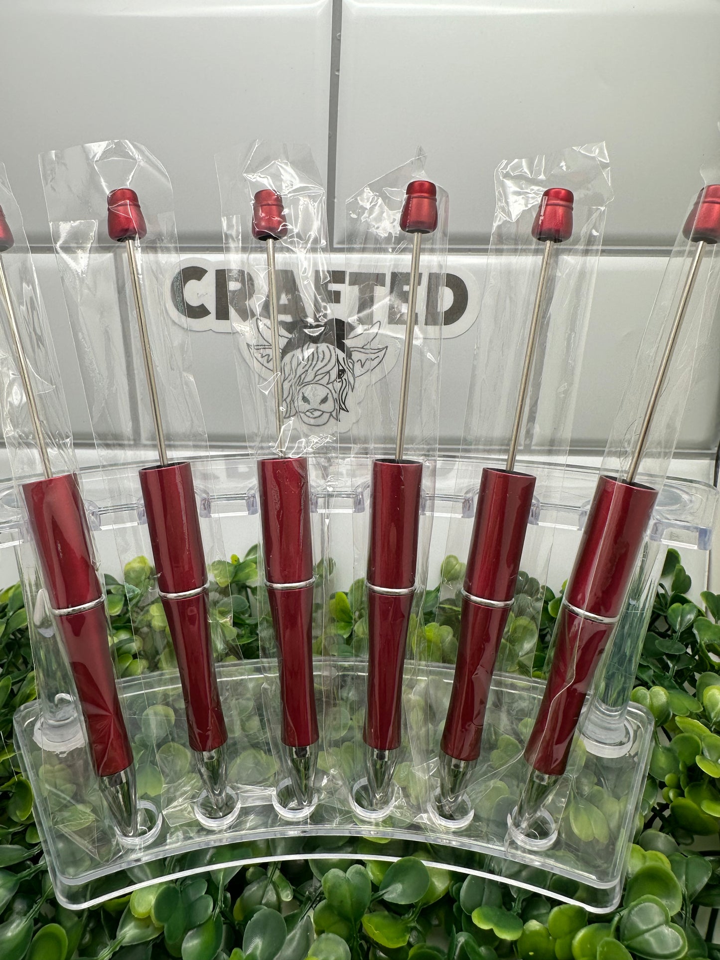 Red plastic beadable pen