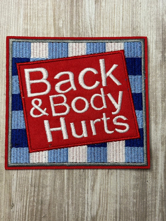 Back and body hurts iron on trucker hat patch (large)