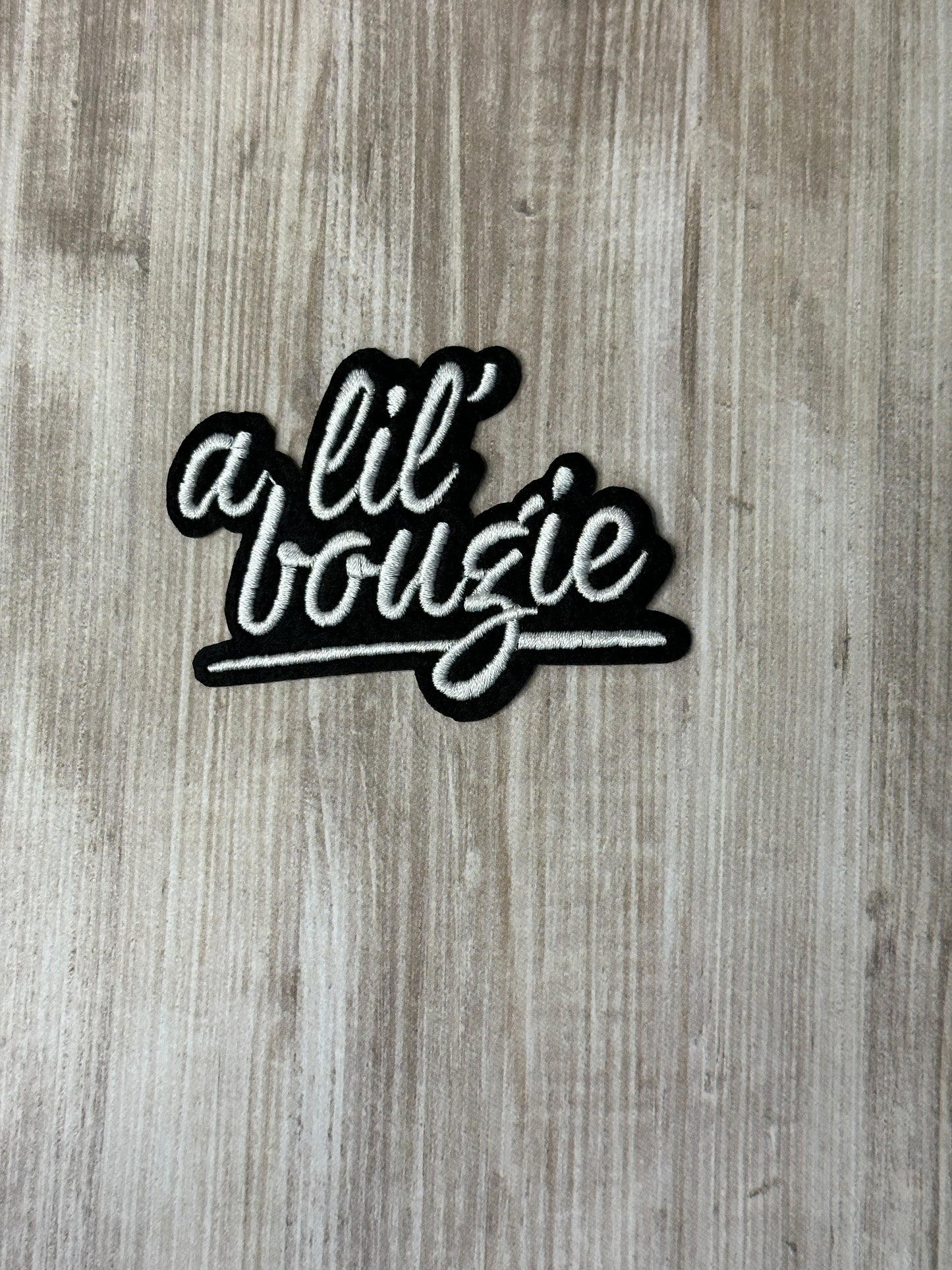 A lil’ bougie iron on trucker hat patch