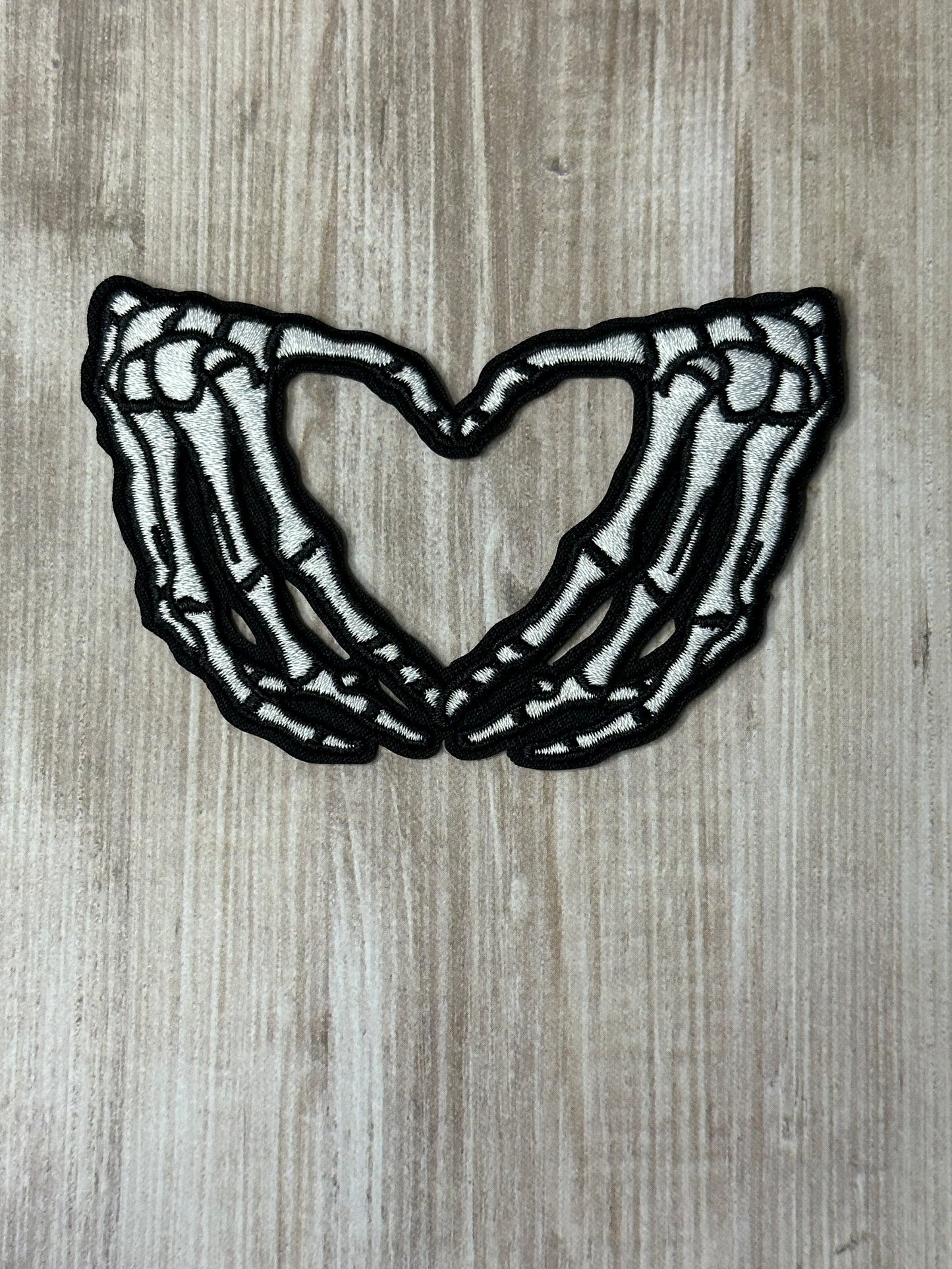 Skeleton heart hands iron on trucker hat patch