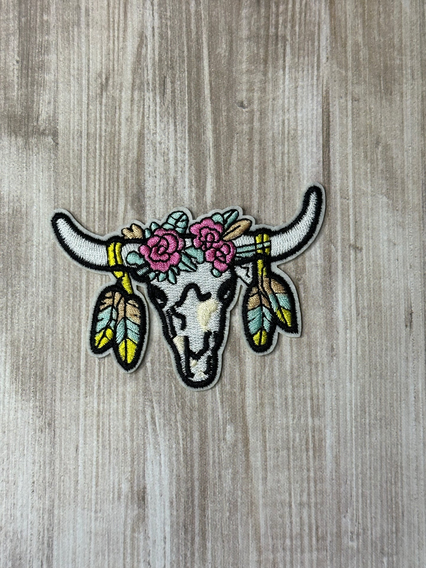 Skull with feathers iron on trucker hat patch