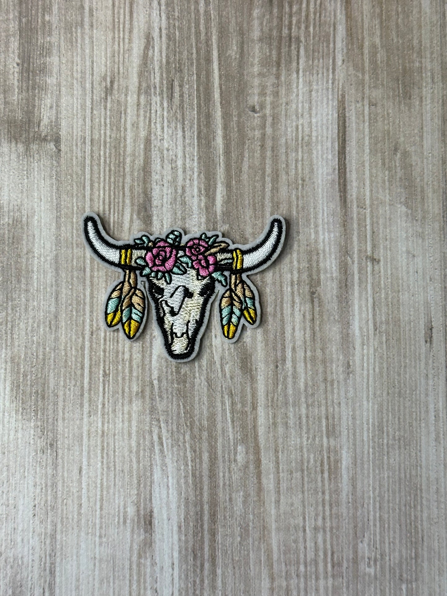 Skull with feathers iron on trucker hat patch